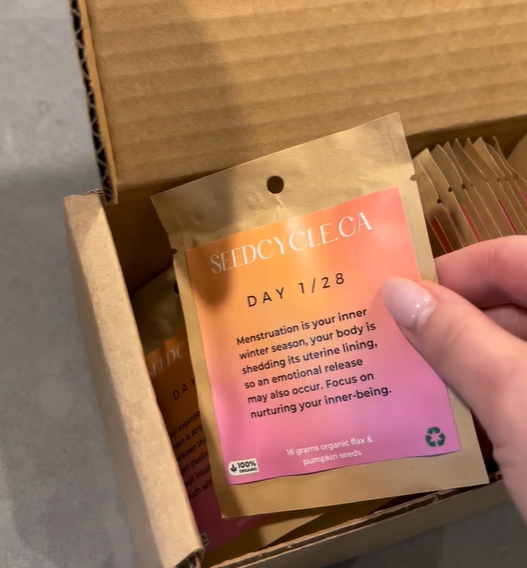Seed Cycle kit box with one pre-measured seed sachet, showcasing convenient packaging and organic seeds for supporting hormonal health and menstrual cycle balance